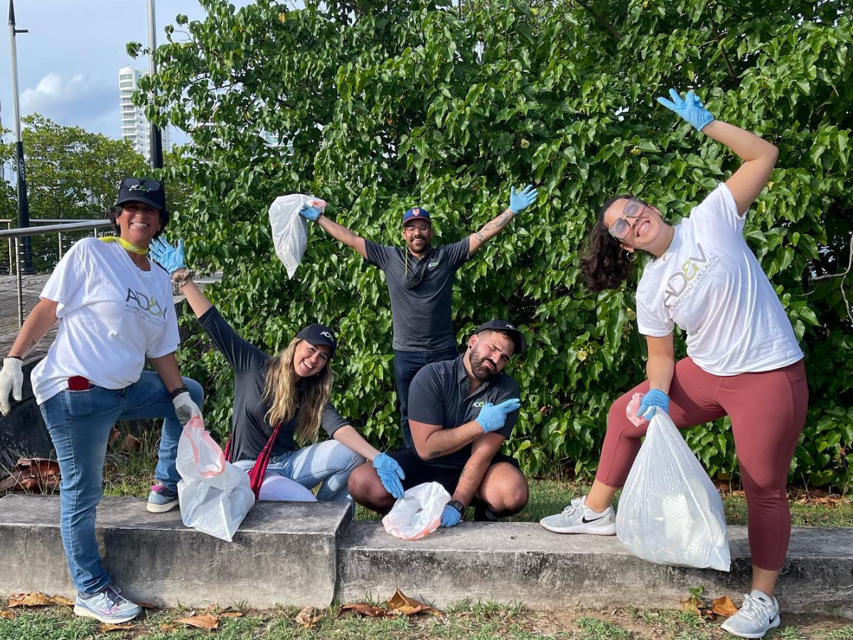 AD&V team volunteering by picking up trash